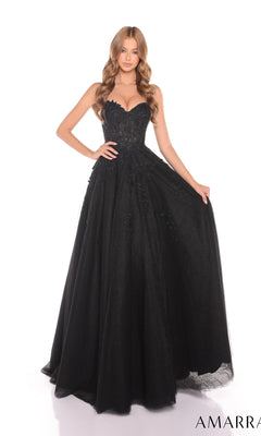 A woman stands against a white background wearing the Amarra 88413 Lace Prom Ball Gown?a strapless, floor-length black dress with a fitted corset bodice and delicate floral lace appliques.