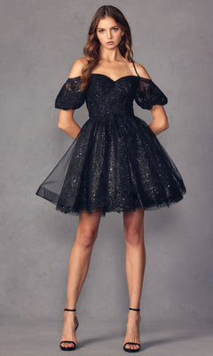 A woman wears the Puff-Sleeve Short A-Line Shimmer Prom Dress 886 with a flared, glittery skirt and black high-heeled sandals, standing against a plain grey background.