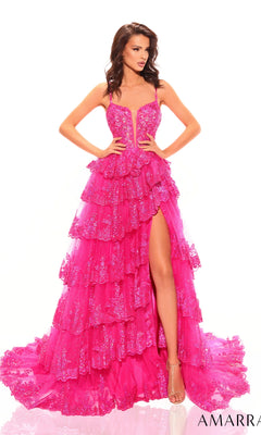 A woman stands against a white background wearing the Amarra Sheer-Sides Long Ruffled Prom Dress 88745, featuring bright pink sequins, a plunging neckline, beaded embroidery, and a high slit.