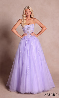 A woman wearing the Strapless Long Prom Ball Gown: Amarra 88913 in lilac—an elegant long ball gown adorned with floral embellishments and featuring a sheer lace corset bodice—stands gracefully against a beige background.