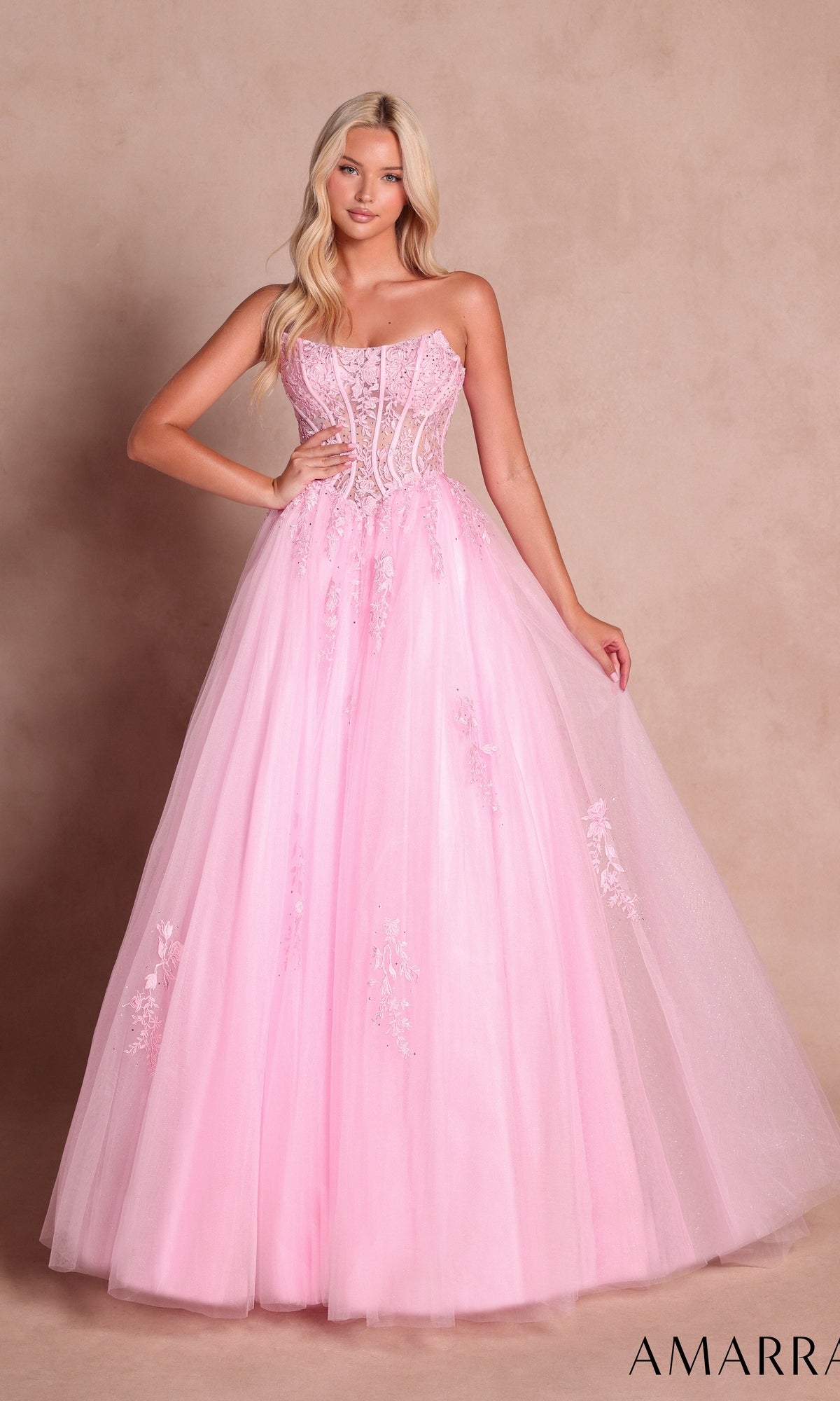 Amarra 88913 strapless pink long ball gown featuring a sheer lace corset bodice and a full tulle skirt with floral embroidery.