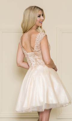 Smiling woman in the Lace-Bodice Short Babydoll Homecoming Dress 8902—a light beige A-line party dress with a lace-up back and delicate lace bodice—stands facing slightly away from the camera.