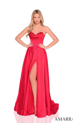Model wears the Amarra 89023, a strapless red satin a-line prom dress with a fitted corset bodice, high slit, flowing skirt, and elegant silhouette, standing against a white background.