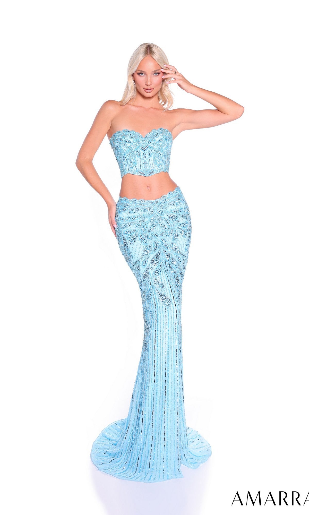 A woman models the Amarra 89059—a light blue, sequined, strapless two-piece prom dress with a fitted bodice and mermaid-style skirt—against a white background.