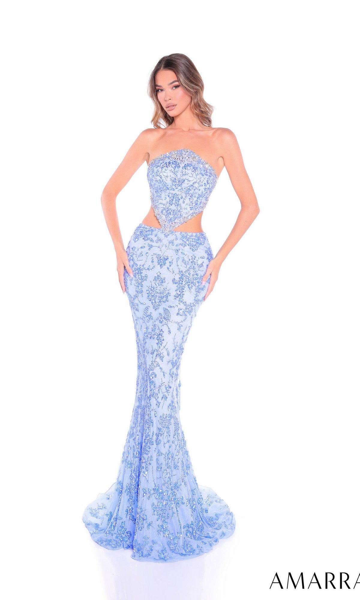 A woman wears the Amarra 89095 long prom dress—strapless, light blue, floor-length with sequins and side cutouts—against a white background. 