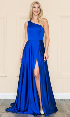 A woman stands indoors against a beige wall, wearing the One-Shoulder Long Prom Dress with Pockets 8912—an affordable royal blue evening gown that is sleeveless and features a thigh-high slit.