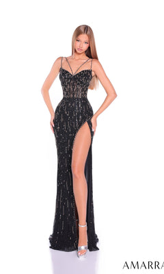 A woman wears the Amarra 89153 long prom dress, featuring a fitted black beaded design with thin straps, sparkling details, and a high leg slit, standing against a white background.