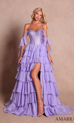 A woman wearing the Amarra 89285 long prom dress in lilac, featuring an embellished corset bodice and a high slit, stands against a plain beige background.