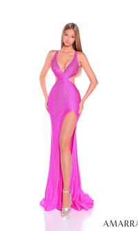 A woman in the Amarra 89341 long prom dress—bright pink, sleeveless, beaded, with a thigh-high slit—pairs silver heels against a white background. The floor-length gown sparkles with dazzling embellishments.