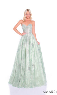 A woman stands against a white background wearing the Amarra 89415 long prom dress, featuring a strapless light green fitted bodice, an A-line tulle skirt, and glittering hot-stone embellishments.