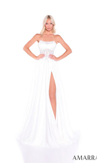 A woman models the Long Prom Dress: Amarra 89423, showcasing its strapless embellished corset bodice with beading and a high-slit skirt, set against a white background.