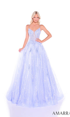A woman stands against a white background wearing the Amarra 89425, a light blue, floor-length glitter tulle prom dress featuring thin straps, a deep neckline, and delicate beaded appliques.