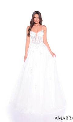 A woman wears the Amarra 89425 long prom dress, a white glitter tulle ball gown with beaded appliques, fitted bodice, spaghetti straps, and voluminous skirt, standing against a white background.