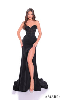 A woman models the Amarra 89439 Long Prom Dress, a black strapless gown with a corset bodice, sweetheart neckline, and high leg slit. She pairs it with clear high heels while posing against a white background.