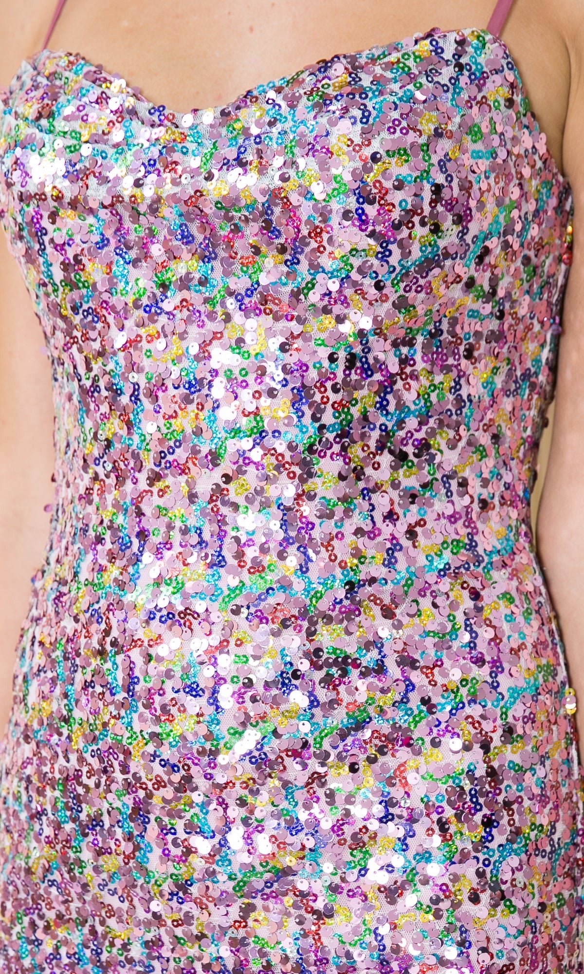 Close-up of a person wearing the Multicolored Short Sequin Homecoming Dress 8944, highlighting the upper torso and part of the sweetheart bodice adorned with vibrant sequins.