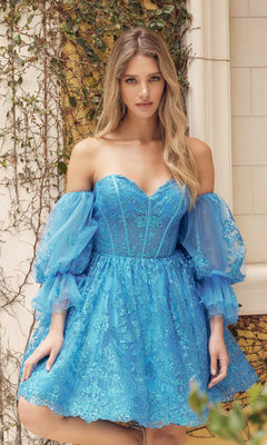A woman stands in front of a vine-covered wall, wearing the Puff-Sleeve Short Strapless A-Line Prom Dress 895, featuring removable puff sleeves and blue lace detailing.