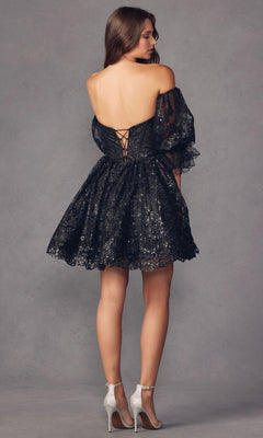 A woman models the Puff-Sleeve Short Strapless A-Line Prom Dress 895, featuring removable puff sleeves, a lace-up back, and black lace fabric; she pairs it with silver heels against a gray backdrop.