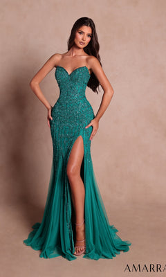 A woman wearing the Amarra 89736 long prom dress in jade, featuring a strapless sweetheart neckline, fitted silhouette with beaded embellishments, and a high-leg slit, stands against a plain beige background.