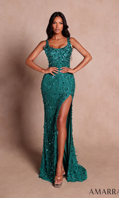 A woman wearing the Amarra 89775 long prom dress in jade—featuring a fitted silhouette, high slit, and textured beaded-style detailing—paired with clear high heels, stands against a plain beige background.