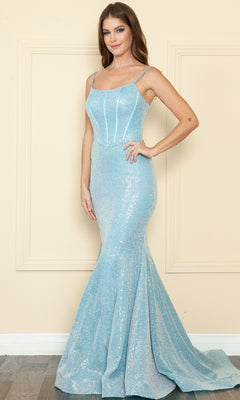A woman wearing the Diamond Sequin-Knit Long Mermaid Prom Dress 8992 in blue poses against a beige wall.