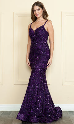 A woman stands indoors wearing the Lace-Up-Back Long Sequin Prom Dress 9002—a fitted, floor-length, sleeveless purple gown with thin straps and shimmering sequins.