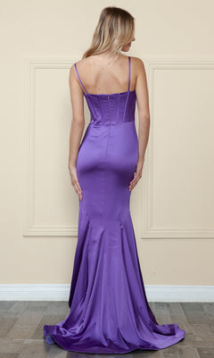 A woman stands facing a wall, wearing the Long Sweetheart Mermaid Corset Prom Dress 9008, a fitted, floor-length purple gown with thin straps and a flared hem.