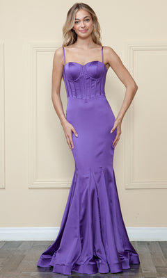 A woman stands against a beige wall wearing the Long Sweetheart Mermaid Corset Prom Dress 9008—a fitted, floor-length purple gown made of stretch charmeuse with thin straps and a structured bodice.