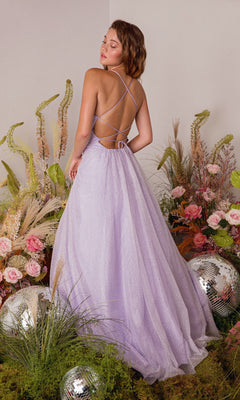 Amid flowers and disco balls, a woman wears the Strappy-Back Glitter Prom Ball Gown: Eureka 9009—a shimmering lavender dress with crisscross straps that radiates glamour for any special occasion.
