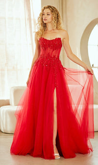 Woman wearing a red evening gown with a high slit in a well-lit room.