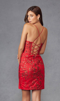 A woman poses against a gray background, looking over her shoulder in the Sheer-Bodice Glitter-Print Mini Hoco Dress JT912A featuring a fitted silhouette, corset-style bodice, sequin details, and lace-up open back.