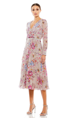 A woman wears the Mac Duggal 9147 Mauve Print Wedding Guest Dress with long sleeves and a V-neckline, paired with silver heels, standing against a plain white background.