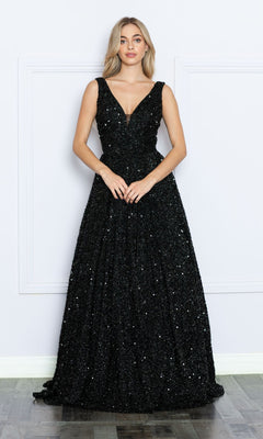 A woman stands against a white wall wearing the Long Black Sequin A-Line Prom Dress 9168, featuring a sleeveless, floor-length design with a deep V-neckline.