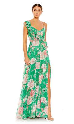 Woman wears Mac Duggal 9175, a long green floral-print formal dress with ruffled details and side slit, paired with strappy heels against a white background—the perfect special-occasion look.