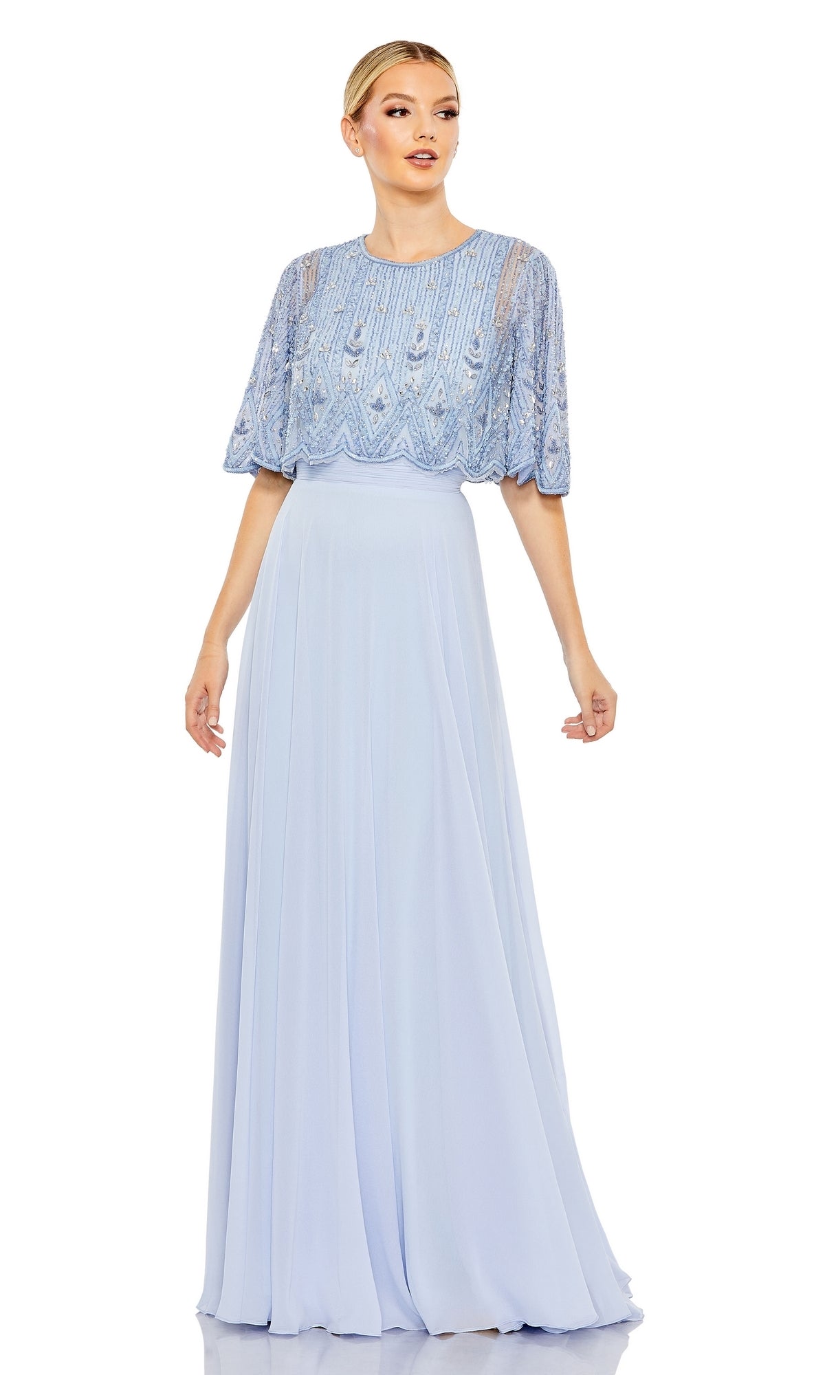 Woman wearing the Mac Duggal 9181 Cape Sleeve Long Formal Dress in light blue, featuring beaded designs on the short-sleeve top and a flowing skirt, standing against a plain white background.