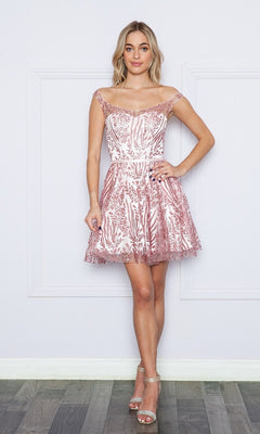 A woman stands against a white wall wearing the Short Glitter-Sequin A-Line Homecoming Dress 9204 and silver high-heeled sandals.