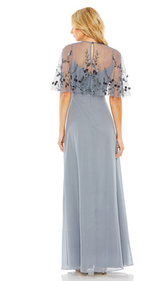Woman in the Mac Duggal 9229 Short-Sleeve Long Prom Dress, featuring light blue fabric, sheer embroidered cape sleeves, and a keyhole back, standing and facing away.
