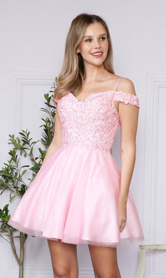 A woman stands by a white wall and green plant, wearing the Lace-Up Off-Shoulder Short Babydoll Hoco Dress9234 in light pink with lace and sequin details.