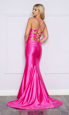 A woman models the Empire-Waist Long V-Neck Mermaid Prom Dress 9256 in shiny hot pink, featuring crisscross straps, a backless design, and a floor-length train, as she stands against a light-colored wall.