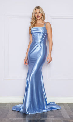 A woman stands indoors against a pale wall with molding, wearing the Corset-Bodice Long Formal Prom Dress 9258—a shiny, light blue, floor-length gown featuring thin straps and a fitted bodice.
