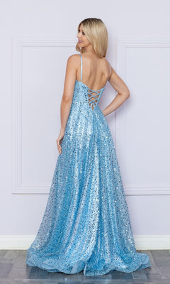 A woman with blonde hair models the Long Sequin A-Line Prom Dress with Pockets 9290, featuring a light blue color, floor-length design, spaghetti straps, lace-up back, and shimmering sequins against a light-colored wall.