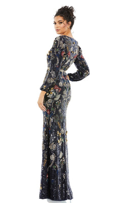 A woman poses in the Mac Duggal Long Formal Dress 93546, showcasing its v-neckline and vibrant sequin floral patterns, standing with one hand on her hip and glancing over her shoulder.