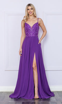 A woman stands indoors in the Sequin-Bodice Long A-Line Prom Dress 9368—a sleeveless purple gown with a sequin bodice and a high thigh slit—posing against a light lavender wall.