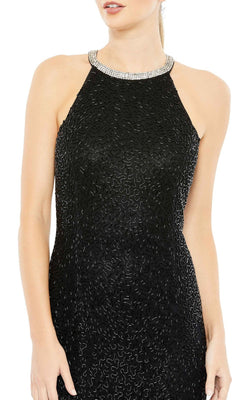 Woman wearing the Mac Duggal 93742 Long Black Beaded Formal Dress, featuring a sleeveless textured design and beaded neckline, shown from shoulders to mid-thigh.