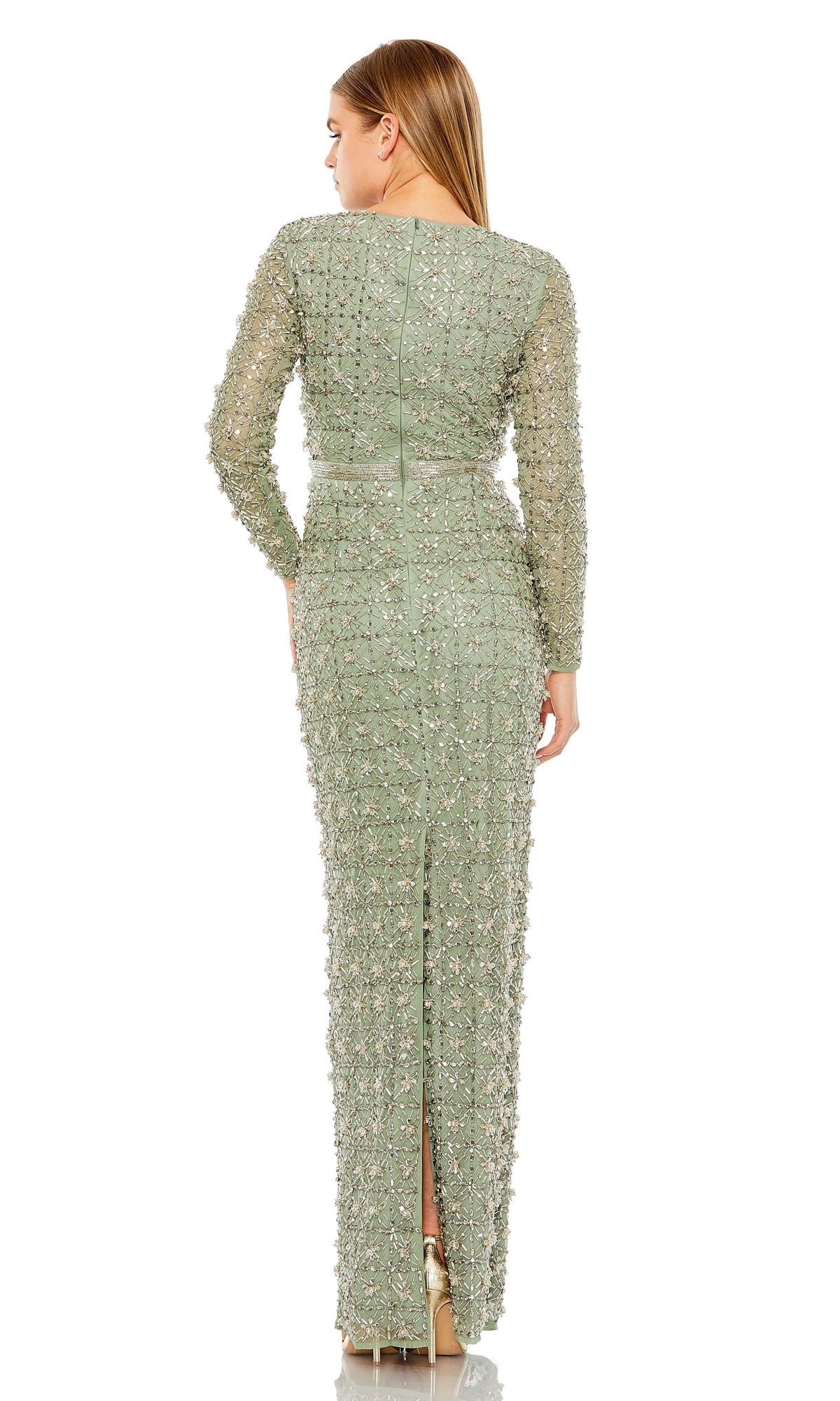 A woman faces away, wearing the Long Formal Dress 93827 by Mac Duggal—a light green, beaded gown with long sleeves, floor-length fitted silhouette, intricate beadwork, back slit, and high-heeled shoes.