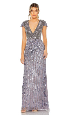 A woman stands against a white background wearing the Mac Duggal Heather Gray Sequin Formal Dress 93914, a floor-length gown with a beaded bodice, sequin skirt, short sleeves, deep V-neck, and pleated accents.