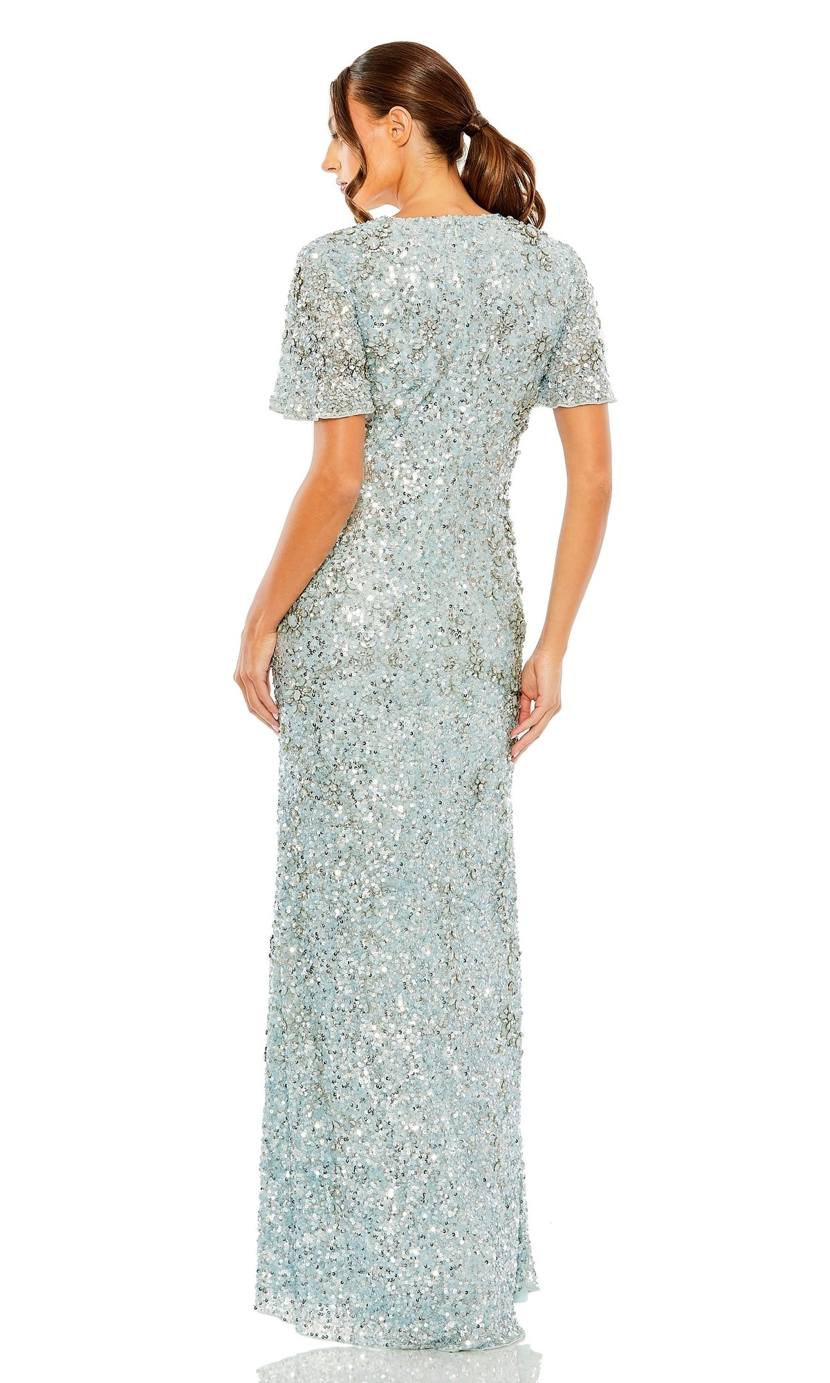 Woman wearing the Long Formal Dress 93932 by Mac Duggal in French blue sequins, floor-length with short sleeves, shown from the back against a white background.