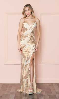 A woman poses by a pink wall in the Long Sequin Formal Prom Dress: Poly USA 9436, a beige and gold gown with a thigh-high slit and silver platform heels—ideal as an elegant evening gown.