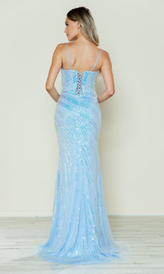 Woman wearing the Lace-Up Long Beaded Prom Dress: Poly USA 9438—a light blue, floor-length gown with thin straps and a lace-up back—stands on a light wood floor, facing away from the camera.