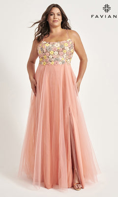 A woman models the Faviana Floral Plus-Size Long Prom Dress 9557, featuring a peach tulle design with floral embroidery and thin straps, against a plain light background. The Faviana logo is in the top right corner.