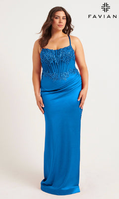 A woman models the Faviana 9592 long plus-size prom dress, a bright blue gown with a beaded corset bodice, lace details, spaghetti straps, and adjustable tie back, standing against a white background with the Faviana logo.